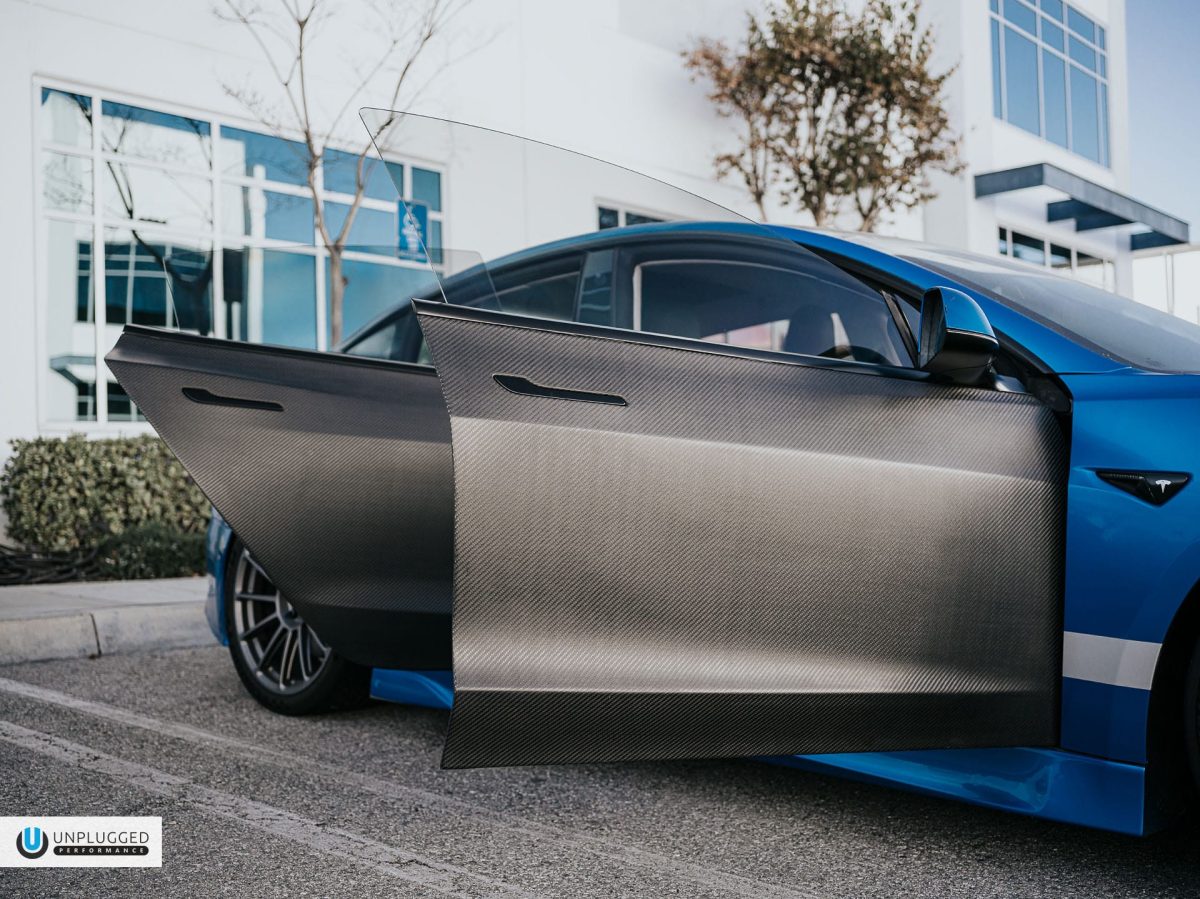 Unplugged Performance Tesla Model 3 With Dry-Carbon Fiber Doors