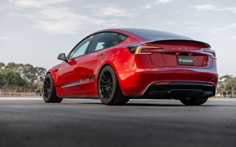 Tesla Model 3 Performance with UP-03 Gloss Black Forged Wheels and Unplugged Performance decals, blending aesthetics with performance.