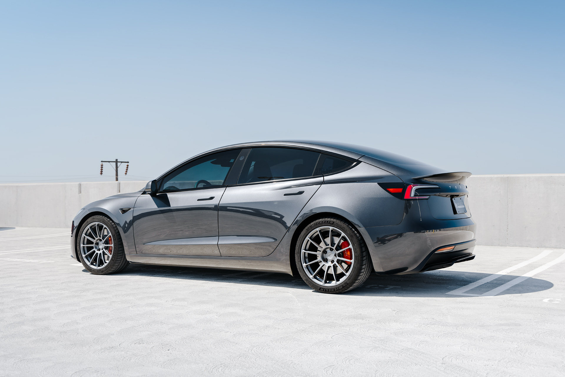Stealth Grey 2024 Tesla Model 3 Performance With OEM Suspension On 19 Stealth Grey 2024 Tesla Model 3 Performance With OEM Suspension On 19