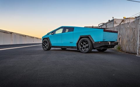 Gloss Sky Blue Wrapped Tesla Cybertruck on 24 inch CYBRHEX wheels in Satin Black