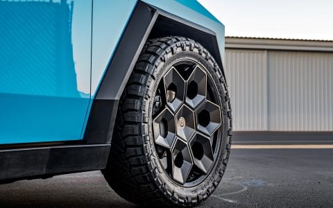 Gloss Sky Blue Wrapped Tesla Cybertruck on 24 inch CYBRHEX wheels in Satin Black