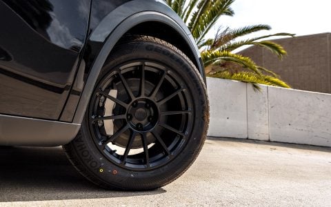 2026 Diamond Black Model Y Juniper on 18 inch Off-Road Spec UP-03 in Satin Black