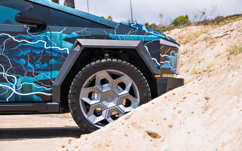 Lightning Graphic Wrapped Invincible Cybertruck on UP Forged 24" CYBRHEX Wheels in Satin Titanium