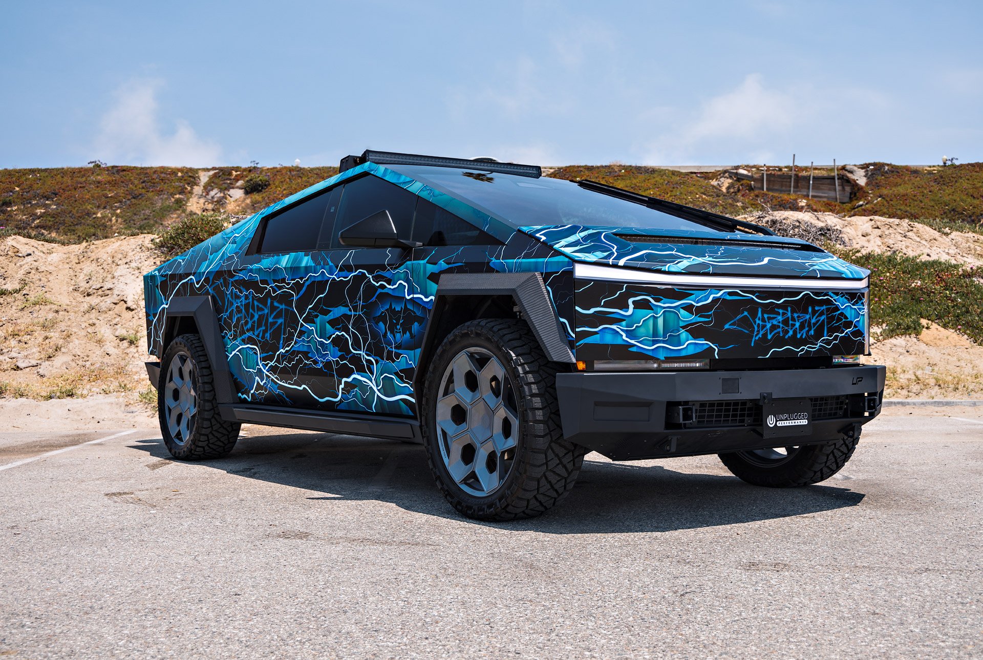 Thunderstruck Invincible Cybertruck 1 Lightning Graphic Wrapped Invincible Cybertruck on UP Forged 24" CYBRHEX Wheels in Satin Titanium