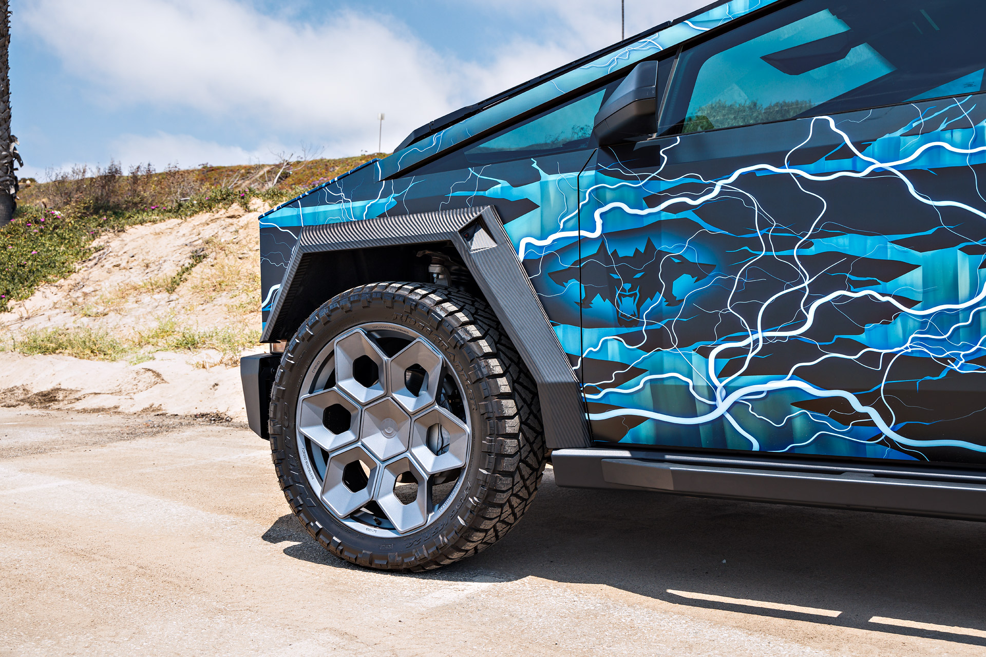 Thunderstruck Invincible Cybertruck 3 Lightning Graphic Wrapped Invincible Cybertruck on UP Forged 24" CYBRHEX Wheels in Satin Titanium