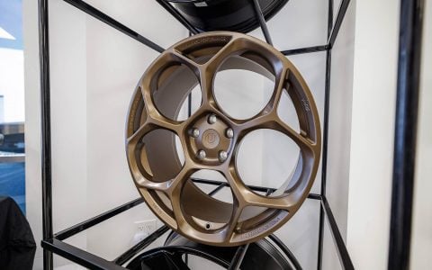 Welcoming Hundreds of Tesla Enthusiasts to Experience the Future of Tesla Customization 20 Unplugged Performance wheels display showcase for guests to view and learn more about.