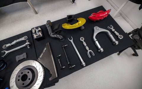 Welcoming Hundreds of Tesla Enthusiasts to Experience the Future of Tesla Customization 16 Unplugged Performance parts display showcase for guests to view and learn more about.