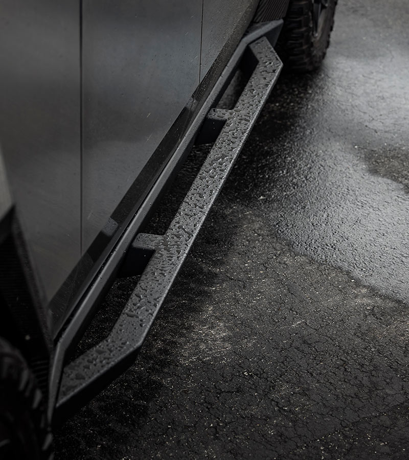 Top 10 Upgrades for the Tesla Cybertruck AWD from Unplugged Performance 7 Unplugged Performance Slider Tesla Cybertruck HD Rock Sliders Mobile 1