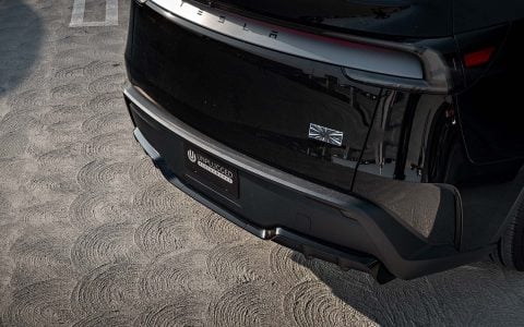 Quicksilver Tesla Model Y Performance With UP Aero Kit Side By Side with OEM Diamond Black Model Y Performance