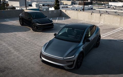 Quicksilver Tesla Model Y Performance With UP Aero Kit Side By Side with OEM Diamond Black Model Y Performance