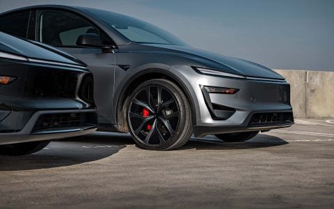 Quicksilver Tesla Model Y Performance With UP Aero Kit Side By Side with OEM Diamond Black Model Y Performance