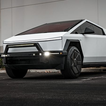 White Tesla Cybertruck with UP INVINCIBLE Steel Front Bull Bar and Rock Sliders