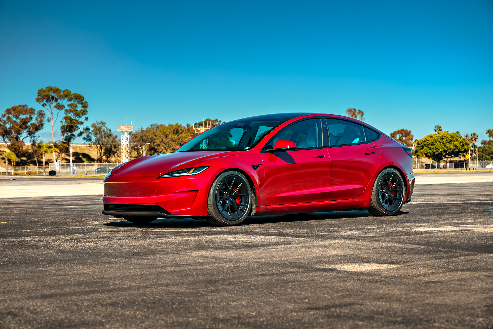 How Does a New Wheel and Tire Setup Affect Range? The Model 3 Performance Test That Made Us Rethink Staggered Fitment 11 Ultra Red Tesla Model 3 Performance Highland on UP-RW Flow Formed 19-inch Wheels Unplugged Performance 1920px (2)