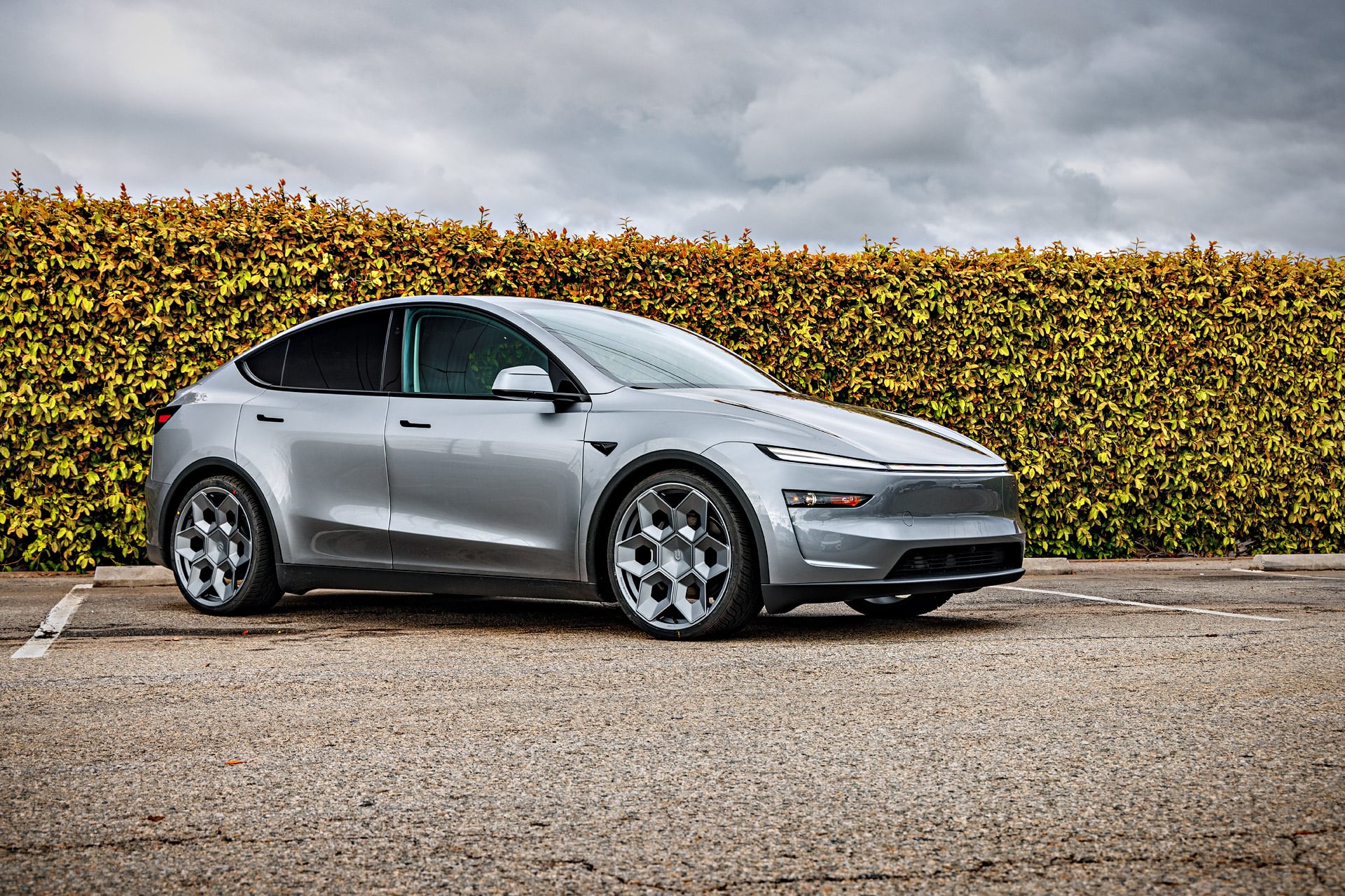 The Father's Day Gift Guide for Every Tesla Dad 16 Tesla Model Y Juniper with Satin Titanium 22 inch CYBRHEX Forged Wheels lowered in Moderate Springs - Unplugged Performance 1920x 15