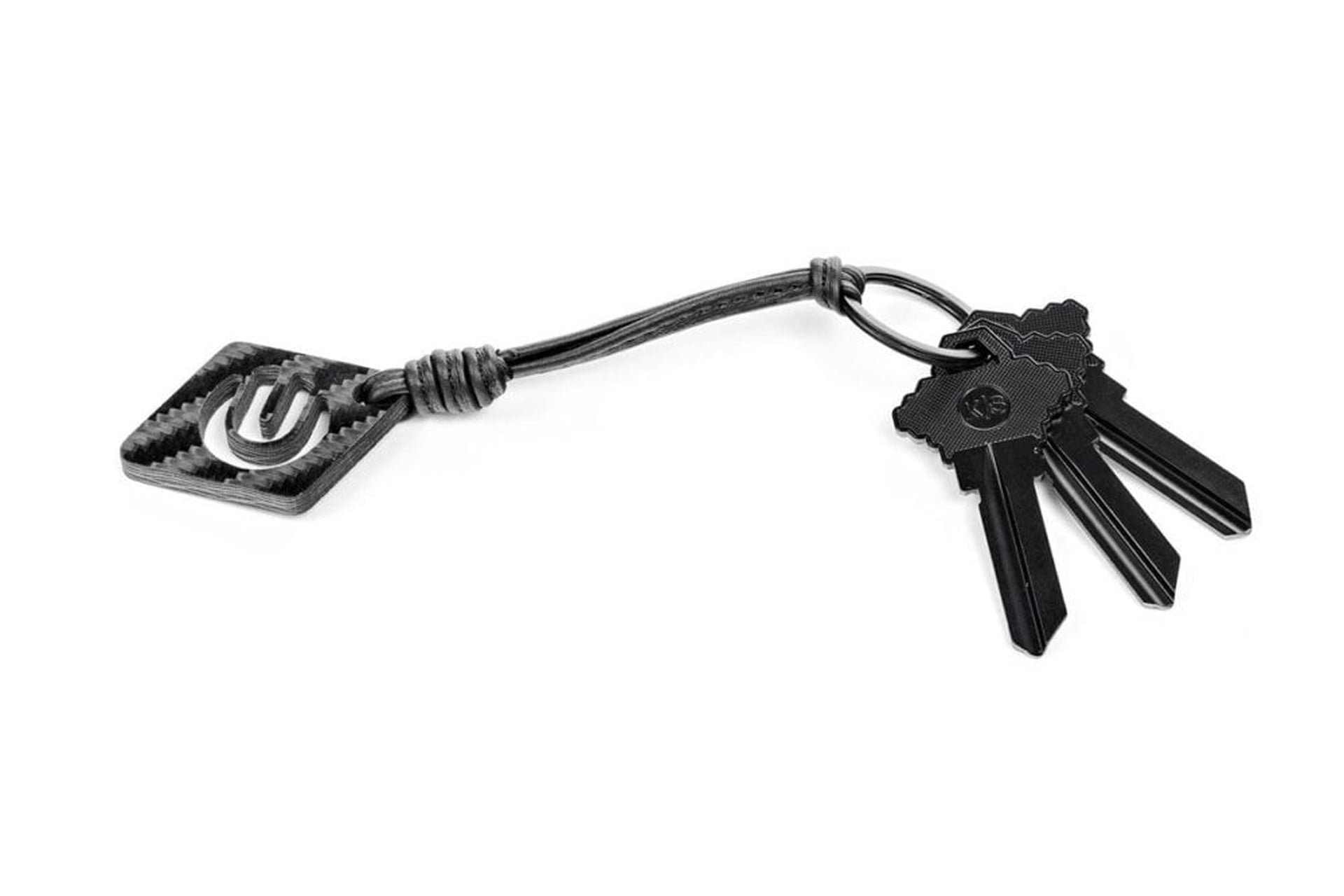 The Father's Day Gift Guide for Every Tesla Dad 9 Unplugged-Performance-Carbon-Fiber-Bamboo-Leather-Keychain