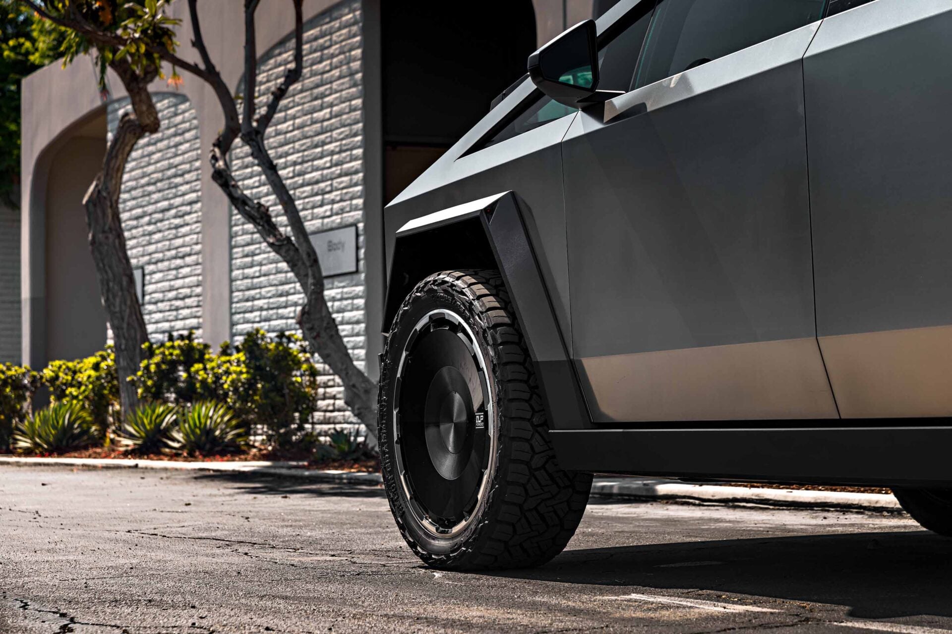 Tesla Cybertruck on 24-Inch UP Forged CYBRDISC Gloss Black Wheels 10 Tesla Cybertruck UP Forged 24-Inch Gloss Black CYBRDISC Wheels Unplugged Performance 10