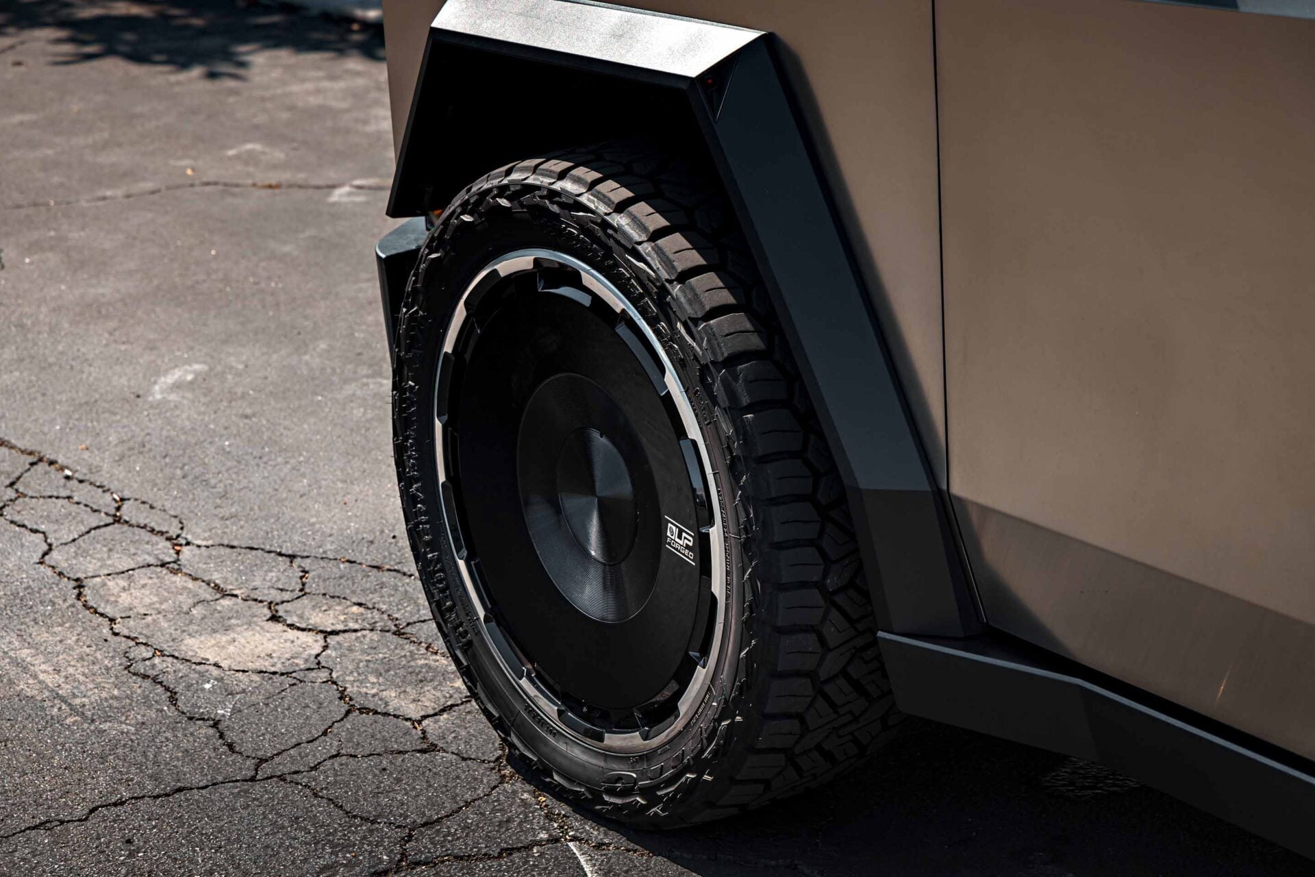 Tesla Cybertruck on 24-Inch UP Forged CYBRDISC Gloss Black Wheels 11 Tesla Cybertruck UP Forged 24-Inch Gloss Black CYBRDISC Wheels Unplugged Performance 11