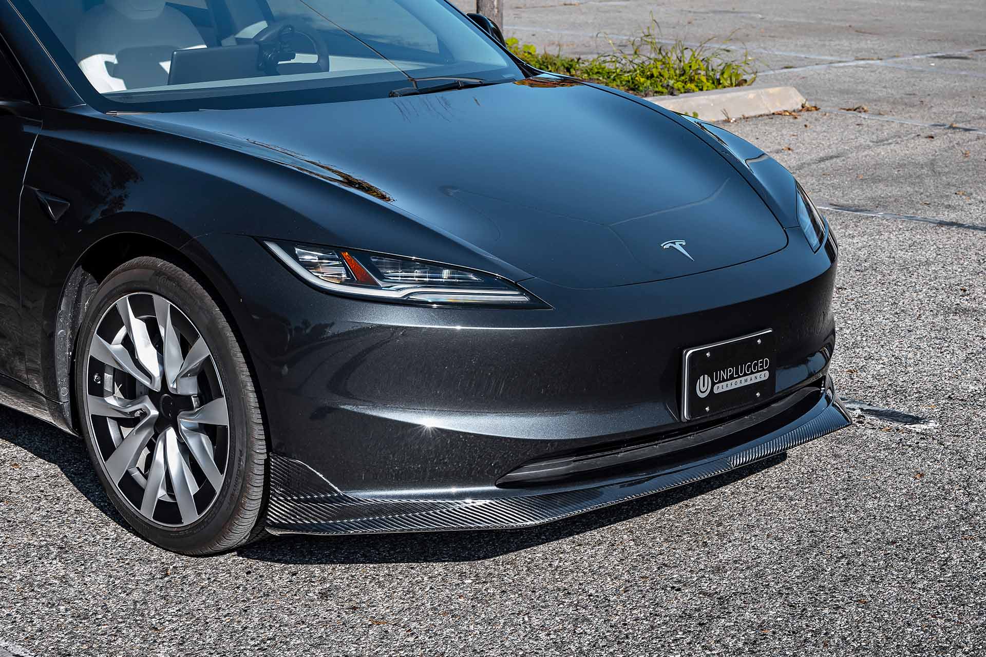 Build Your Model 3, One Piece at a Time: Carbon Fiber Upgrades In Stock 8 Tesla Model 3 Carbon Fiber 2-Piece Front Lip Splitter Unplugged Performance 1