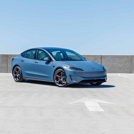 Featured Image for Frost Blue Metallic Tesla Model 3 Performance on 20-Inch Satin Titanium UP-05 Wheels article