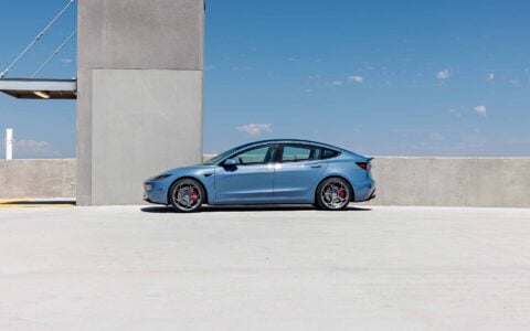 Frost Blue Metallic Tesla Model 3 Performance on 20-Inch Satin Titanium UP-05 Wheels 2 Tesla Model 3 Performance Highland on 20-Inch UP-05 Satin Titanium Forged Wheels Unplugged Performance 3