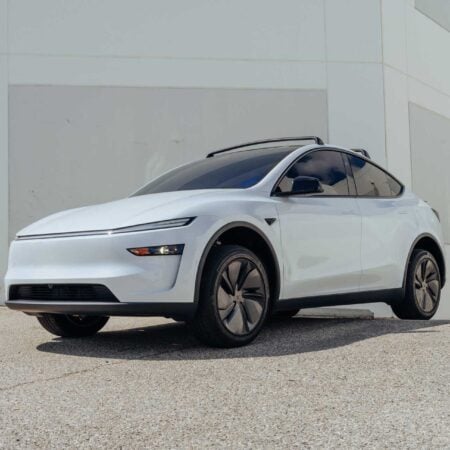 Featured Image for Pearl White Tesla Model Y Juniper on Leveling Lift Kit article